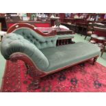 A Victorian mahogany chaise longue, buttoned green velour upholstery,