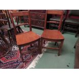 A pair of elm East Anglian kitchen chairs circa 1790, rope twisted back slats, panel seats,
