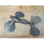 Two brass propellers