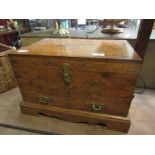 A 20th Century Eastern hardwood storage chest with twin drawers,