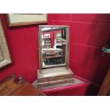 An early George III mahogany swing toilet mirror with gilt fillet and three small drawers to the
