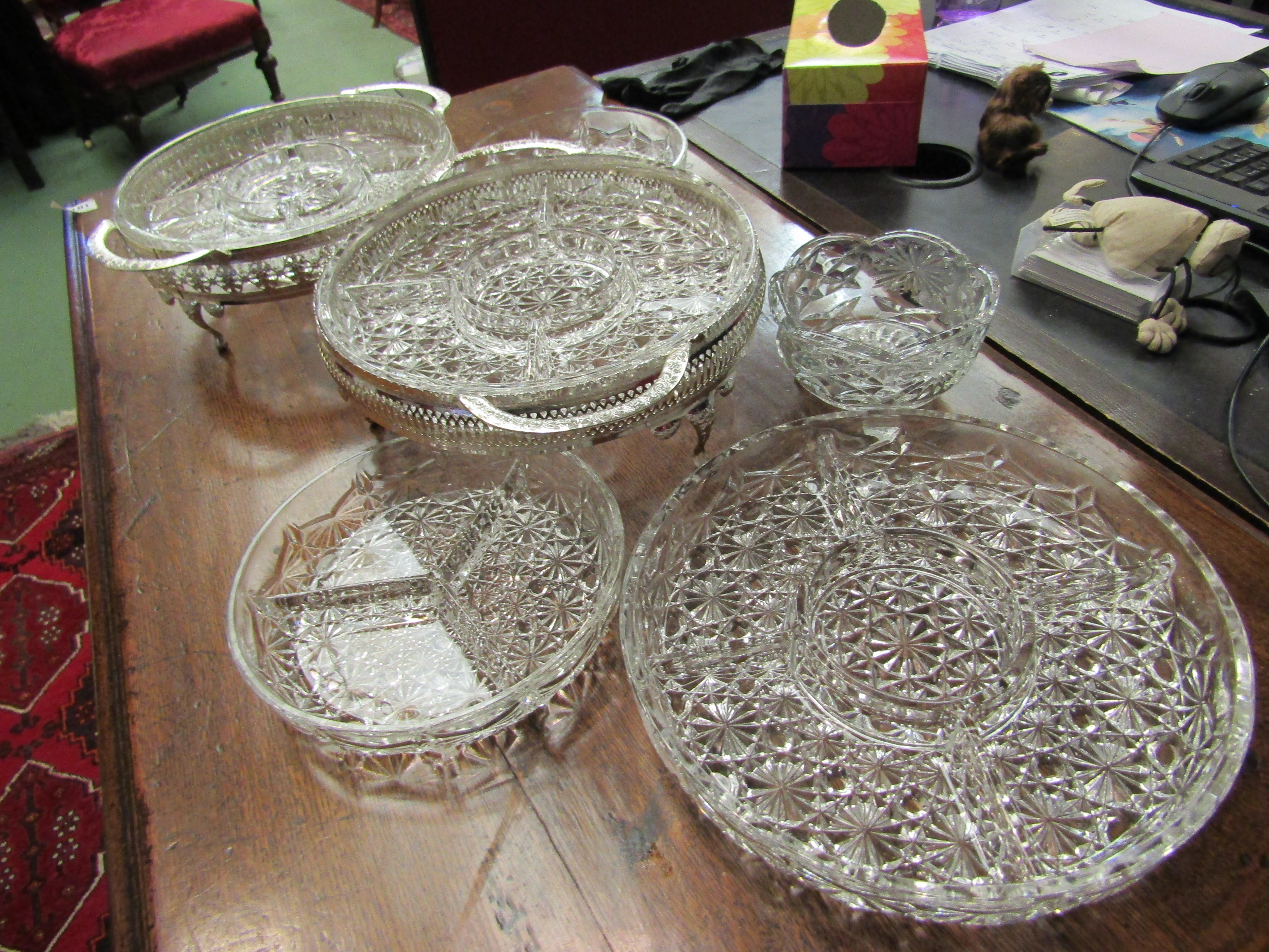 A selection of glassware including serving dishes on plated stands