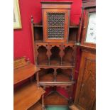 A late Victorian Moorish-style mahogany corner cabinet, full height,