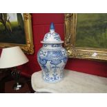 A pair of late 20th Century large blue and white baluster ginger jars with covers,