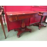 A Victorian mahogany card table on pedestal base