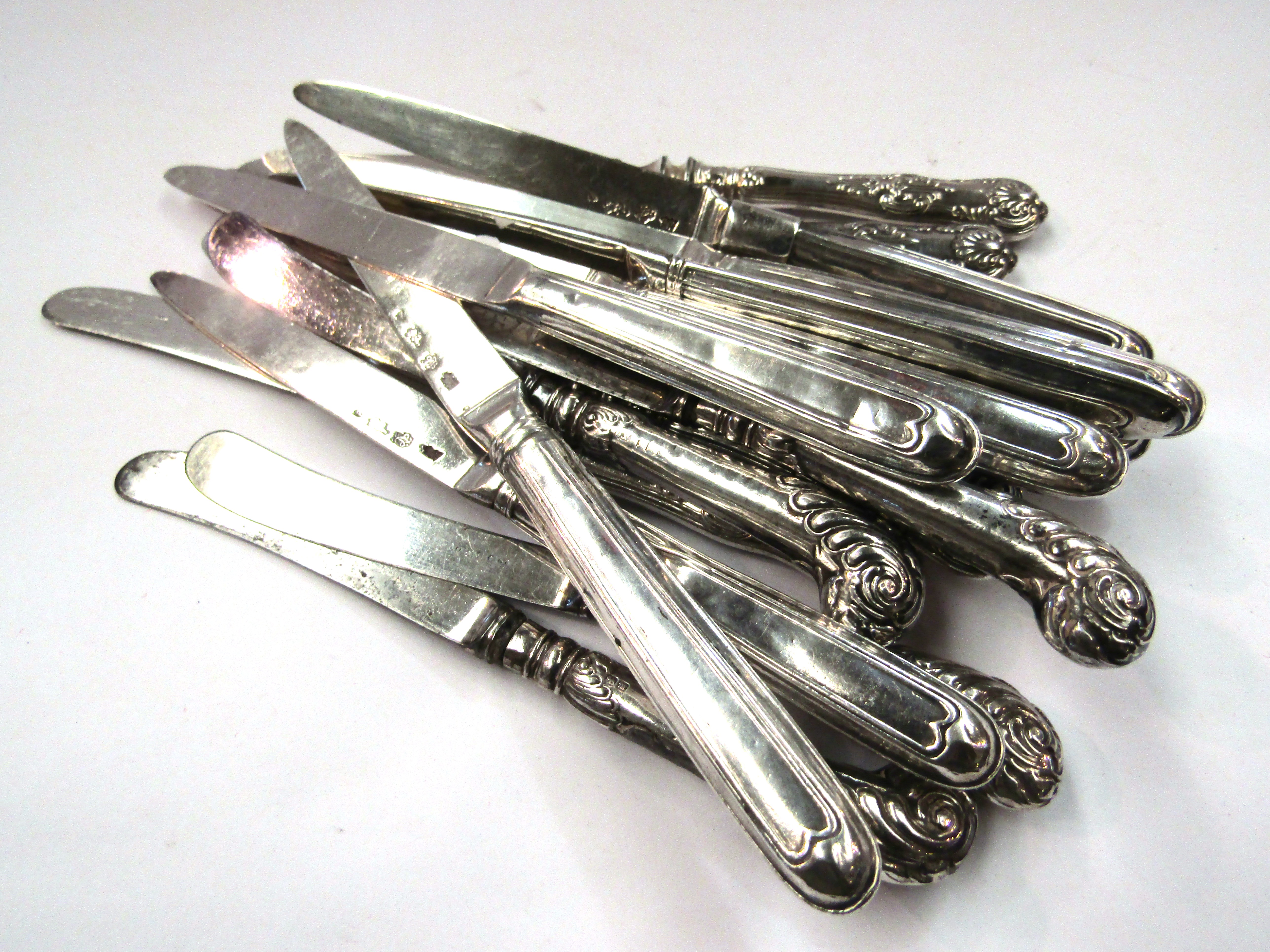 19 silver plate knives