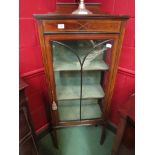 An Edwardian mahogany glazed china cabinet