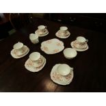 A quantity of "Windsor" bone china teawares, floral sprays,