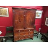 A 19th Century mahogany inlaid wardrobe, over a two short and two long drawer base,