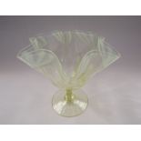A vaseline glass frilled vase,