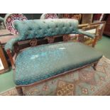 A late Victorian sofa with lyre supports