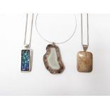 Three silver hallmarked pendants with banded agate and glass panels