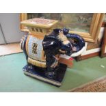 A late 20th Century ceramic elephant jardinere stand