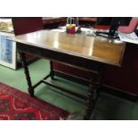 A 'Titchmarsh & Goodwin' 17th Century style oak side table the carved single frieze drawer over