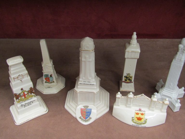 A collection of crested ware memorial figures including Bishop's Stortford and City of London (6)