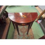 A mahogany demi-lune hall/side table with hand painted floral decoration on spade foot square