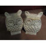 A pair of marble owl form bookends