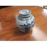 An 18th Century Oriental porcelain lidded vase in blue and white