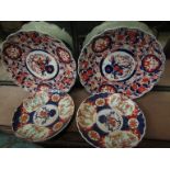 Two pairs of early 20th Century Imari chargers,
