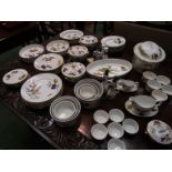 A large collection of Royal Worcester "Evesham" pattern dinner wares including casserole dishes,