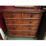 A 19th Century mahogany two over three chest of drawers on bun feet