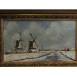 SMIT; An oil on board of wintry mill scene,