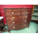 A late Georgian mahogany bow fronted chest of two short over three long drawers,