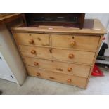 A Victorian pine chest of two short over three long drawers