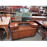 A 1950's walnut veneered dressing chest with mirror