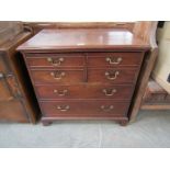 A Georgian mahogany commode chest