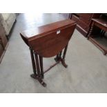 A small late Victorian walnut drop-leaf Sutherland table,