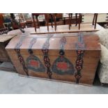 A large 19th Century oak and metal bound marriage chest with hand painted front 160cm wide