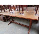 An early 20th Century oak refectory table with double column support 183 x 82cm