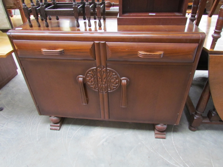 A 1950's oak sideboard by Jentique