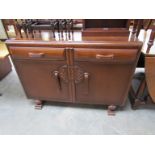 A 1950's oak sideboard by Jentique