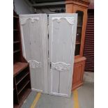 A pair of 19th Century painted French armoire doors 185t x 64 and 54cm wide
