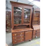 A Victorian pine scumble dresser and bookcase