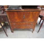 A 1950's light oak draw-leaf kitchen table with Formica top 76cm x 84cm (138 extended)