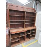 An Arts & Crafts bookcase in two sections 168 x 215 cm tall