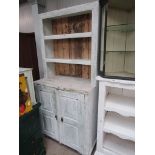 A Continental painted pine two door dresser,