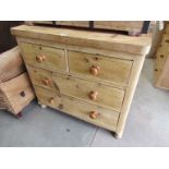 A Victorian pine two over two chest of drawers