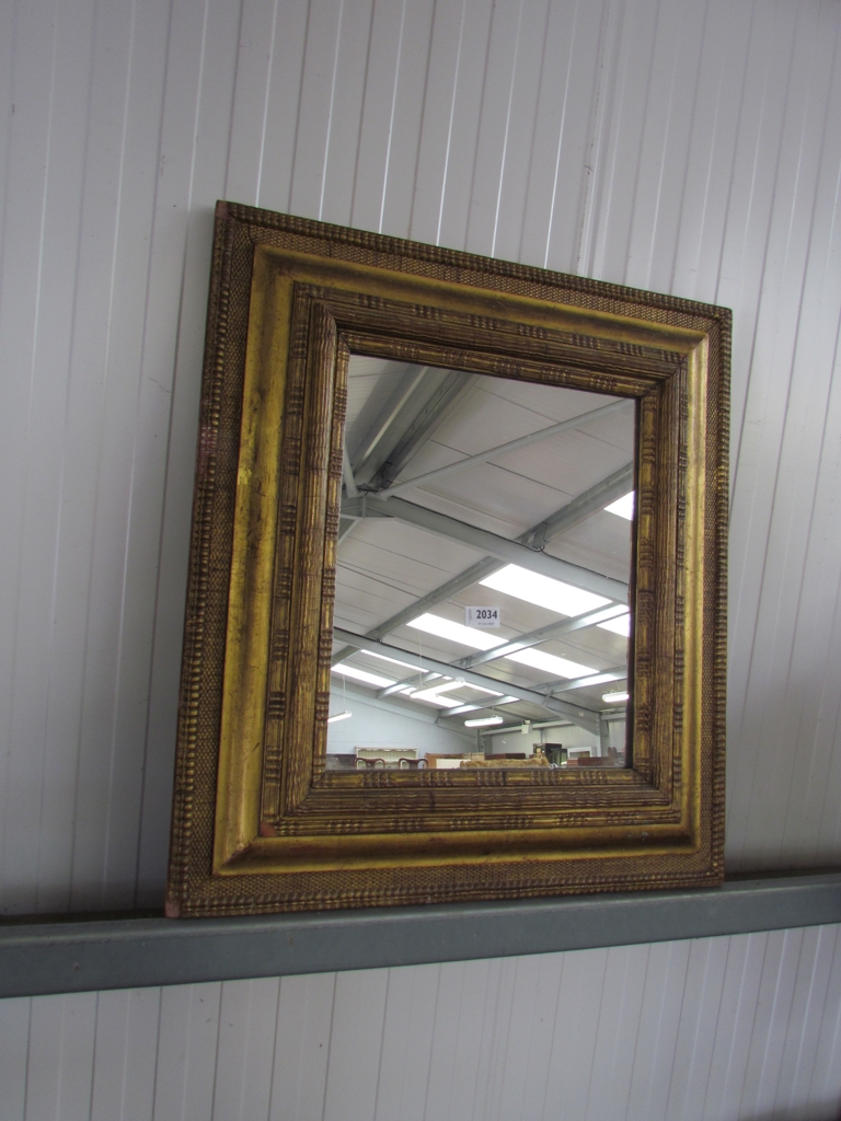 A 19th Century gilt framed mirror, later mirror plate,