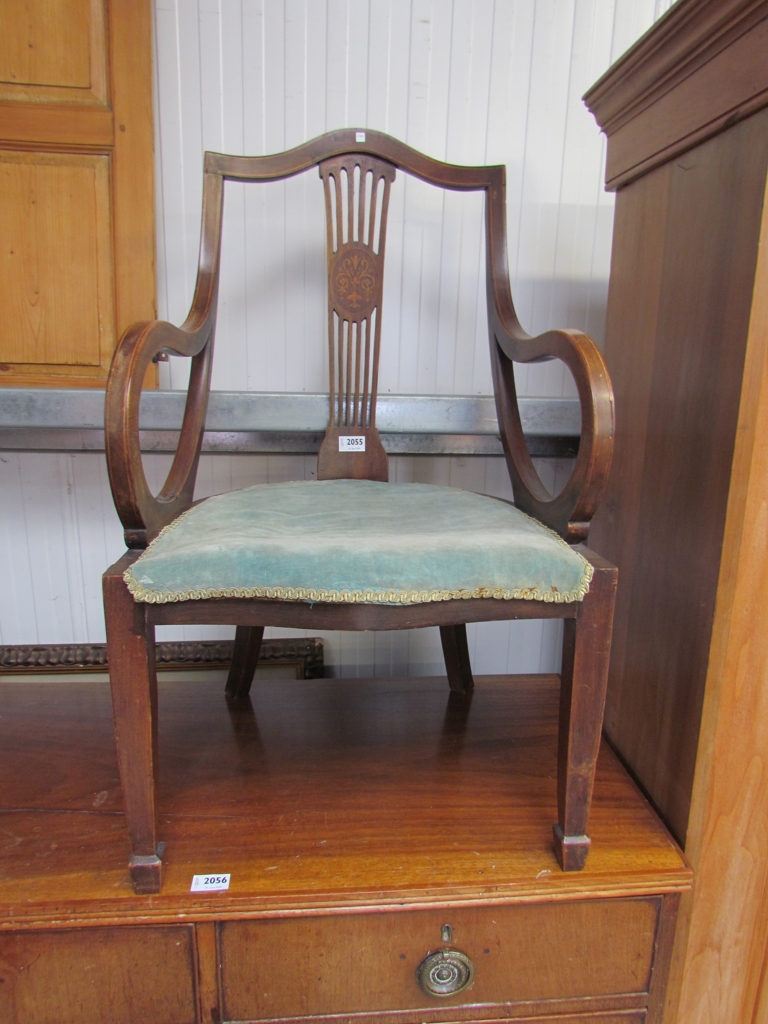 An Edwardian mahogany in ladies bedroom chair with scroll arms for re-upholstery