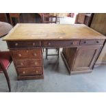 A Victorian pitch pine twin pedestal desk for restoration,