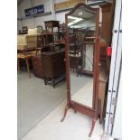 A 1930's mahogany cheval mirror