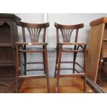 A pair of beech bentwood bar stools