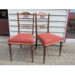 A set of four 19th Century inlaid rosewood chairs