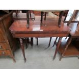 A Georgian mahogany card table