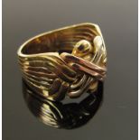 A gents three tone gold ring stamped 585.