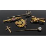 Two stick pins, a paste set bar brooch, 9ct bow brooch and gold Intelligence Corps brooch unmarked,